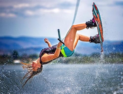 Elle Christensen, 14, performs a backflip as she competes in the Women's Open class Saturday, July 14, 2018, during the 20th. 